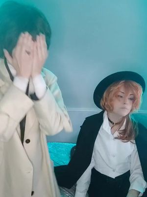 A post by @kirya_cosplay on TikTok caption: well #dazai #dazaiosamu #chuuya #chuuyanakahara #bungoustraydogs #bsd #dazaicosplay #chuuyacosplay #bungoustraydogscosplay #dazaixchuuya #fyp #Pride #gay