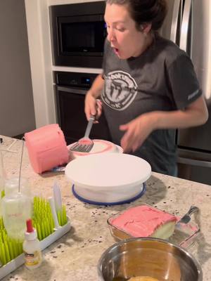 A post by @what_duh_tok on TikTok caption: Practice run of baby girls smash cake… note to self, use a cake board. It ain’t pretty but at least it tastes good #bakingfail #smashcake #mamashark #babyshark #itried #fail