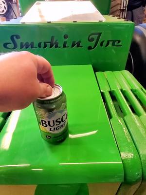 A post by @smokinjoe33 on TikTok caption: John Beer on a Deere #johndeere #buschlight #forthefarmers #fyp #foryoupage #promotepulling365 #viral