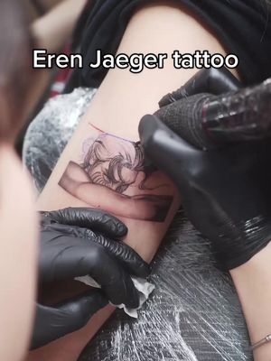 A post by @xoxoshanaya on TikTok caption: Eren as the fallen angel 👀 #anime #fyp #animetattoo #attackontitan #erenjaeger #eren #tattoo #fypシ #attackontitanseason4 #aot #fallenangel #animefanart