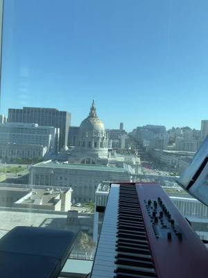 A post by @mustbemerrick on TikTok caption: 🌍 #piano #music #pianopop #80s #80smusic #toto #playbyear #sanfrancisco #cityhall #pianotok #musictok #fyp #pianist #pianistsoftiktok #trending #songrequests #africa