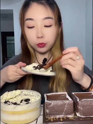 A post by @foodie9527 on TikTok caption: #yummy #cake #Foodie #delicious #asmrsounds #asmr #chocolatelover #chocolate #chewing #chewingsound