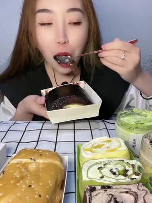 A post by @foodie9527 on TikTok caption: #yummy #Foodie #delicious #asmrsounds #asmr #chocolate #chewingsound #chocolatelover #chewing #cake #delicacy #mocha