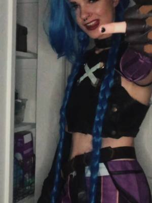 A post by @nothink.cos on TikTok caption: Tramsition 🗿@lilbean.cos #jinx #jinxarcane #jinxcosplay #powderarcane #vi #vicosplay #viarcane #arcane