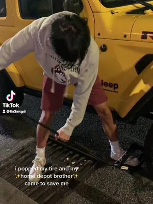 A post by @lin3angel on TikTok caption: the guy showed up and was like “anyone here know how to change a tire?” 🥸