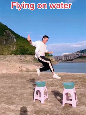 A post by @kongfulife on TikTok caption: Kungfu of flying in water#kungfu #shaolinkungfu👊 #fyp #respect