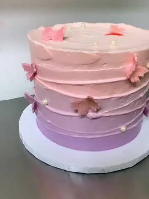 A post by @macaretto_ on TikTok caption: Butterfly cake ,#fyp#cake#buttercream #smooth#viral