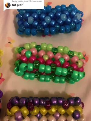 A post by @emo_kandi on TikTok caption: Replying to @ok_then111 part 1 #kandi #kandikid #kandicuff #kandibracelet #bracelet #braceletkandi #green #pink #greenpink #purple #yellow #purpleyellow #blue #orange #blueorange #PrimeDayDreamDeals #fyp #fypシ #fypシ゚viral