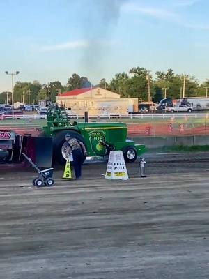 A post by @smokinjoe33 on TikTok caption: Smokin Joe's run at big butler fair #fullpullproductions #promotepulling365 #johndeere #fyp #foryoupage #trending#buschlight @fullpullproductions