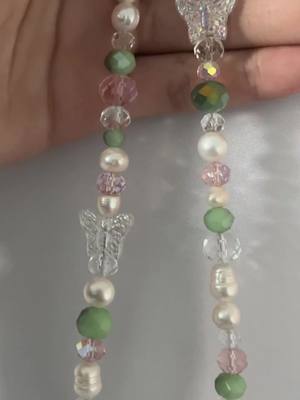 A post by @therefashioncollective on TikTok caption: Trying some different styles! Should we release it? #beadnecklace #smallbiz #y2kfashion #SummerFashion #jewelry