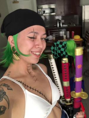 A post by @wagyubeeef on TikTok caption: I do love my sweet tatties #onepiece #strawhatpirates #zoro #roronoazoro #cosplay #cosplayer #animematsuri #fyp