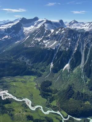 A post by @pilotpatt on TikTok caption: Who can figure out where this is? Heres a guess, Northern BC! #helicopter #views #mountains #heli #bell206 #longranger