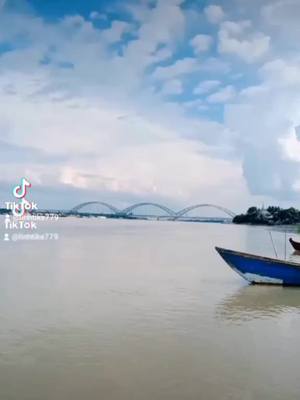 A post by @linhtike779 on TikTok caption: ဘယ်မှမသွားပါဘူးဗျာ❤️မြစ်ဘေးစိတ်ညစ်လို့တစ်ယောက်ထဲသွားထိုင်တာပါ❤️#Foryou #ရောက်ချင်ရာရောက်တော့😑 #ကျောက်ဆည်မြို့ကပါဗျ #အမြင်မတော်ရင်ကျော်သွားပါ🤗