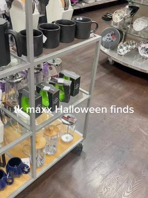 A post by @spookyemjane on TikTok caption: seeing Halloween makes me happy #horror #halloween #tkmaxx #tkmaxxhaul #codeorange