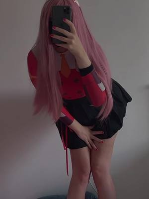 A post by @erroruserecchi on TikTok caption: #zerotwo #cosplay #anime