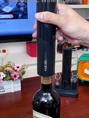 A post by @homestore33 on TikTok caption: Automatic Bottle Opener #opener #wineopener #kitchengadgets #household #goodthingsinlife 