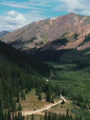 A post by @magicxmeg on TikTok caption: #happyplace #drone #djimavic2pro #colorado #jeep #WorldPrincessWeek #AEJeansSoundOn