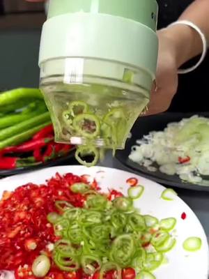 A post by @homestore33 on TikTok caption: Gargling Vegetable Chopper #KitchenHacks #vegetablechopper #vegetablecutter #garlicgrinder #vegetableslicer 