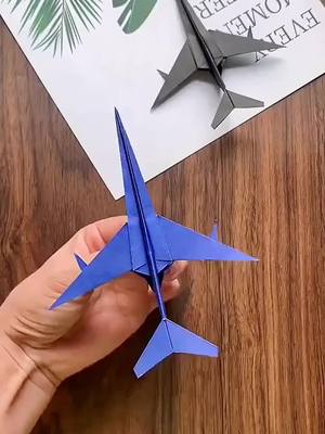 A post by @kungfu_art on TikTok caption: Aircraft #origami #paper #art #ArtTok #creative #handwork #handmade #DIY #diytiktok #ideas #viral #easy #funny