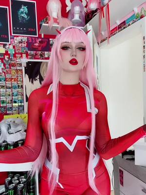 A post by @cosplayerino on TikTok caption: Happy Saturday! || Zero two remake <33 #zerotwo #zerotwocosplay #ditf #ditfcosplay #egirls