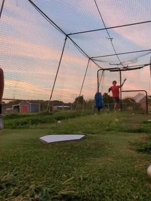 A post by @baseballbots.3 on TikTok caption: sunset bp #fyp #baseball #bp #righty #lefty #woodbats #batcrack #satifying #cagebombs #baseballszn 