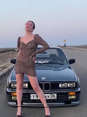 A post by @official.car.girls on TikTok caption: #cargirl #cargirls #cargirlsoftiktok #bmw #bimmergirl #bmwgirl #fyp #foryoupage #carporn #cartiktok #carhub #bmwe30