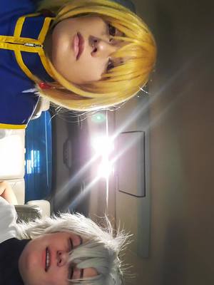 A post by @nicohasperished on TikTok caption: Our lovely and only con video for today || @gerard_keay #hxh #cosplay #fanx #killua #kurapika