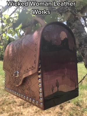 A post by @wickedwomanleatherworks on TikTok caption: Custom Purse 🙌 Nothing quite like packing around a beautiful new purse that you know no one else has ♥️ #purse #custompurse #oneofakind #leatherart #wickedwomanleather #wickedwomanleatherworks #costomorder #leatherwork #leathercraft 