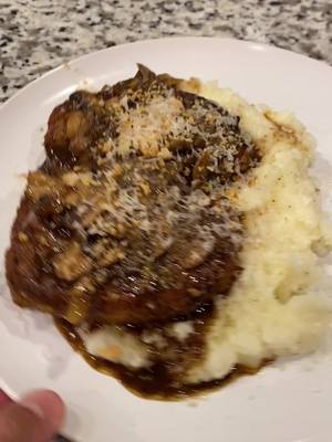 A post by @reecekennedy04 on TikTok caption: Smothered Pork Chops #cooking 