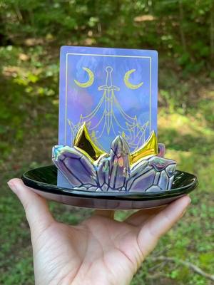 A post by @dirtworks_ceramics on TikTok caption: Crystal deck holders are up for preorder! #tarot #deckholder #fyp #magick #magic #crystal