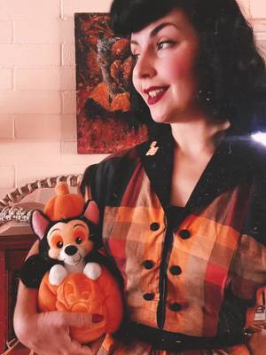 A post by @misslarkbahar on TikTok caption: Very cool. #halloween #spookyseason #vintagefashion #1940sfashion #1940shair 