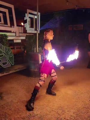 A post by @tashwildfire on TikTok caption: I love my job ❤️‍🔥 *I am a professional do not try this at home* #firedancer #fireperformer #firepoi #poispinner #circuslife