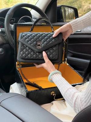 A post by @luxury_goodss on TikTok caption: Black messenger bag