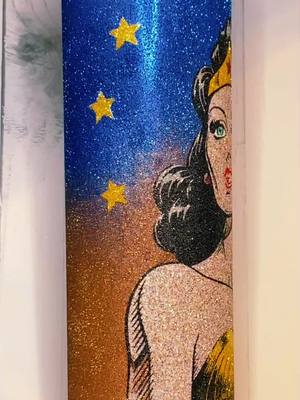 A post by @lovelala73 on TikTok caption: ##lovelala73 #fyp #DidYouYawn #art #live #fanart #wonderwoman #crystalac #freedomglitter #kkcustoms #glitterhappy #eliteglitter #kgdglitterco #vintage #woman #womanpower #dc #bulletproof