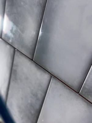 A post by @danvrenos on TikTok caption: Vertical offset pattern with some cool variation on these subways #grouting #shower #subwaytiles #largeformat #schluter #loop #daftpunk 