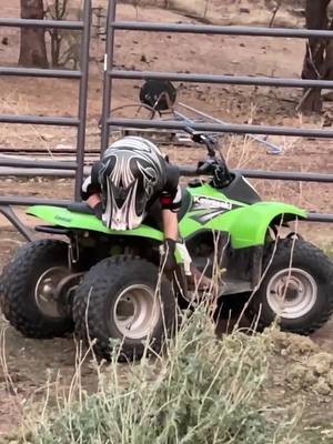 A post by @nismojames on TikTok caption: Just making sure his tires survived 😂🥺🥰 #atv #kawasaki #daddysboy #countryboy #coolkid #littleman #myboy #quad #kfx #offroad #wildboy 