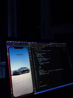 A post by @codingtok on TikTok caption: Coding a Tesla UI in React Native! 👨🏼‍💻 #developer #tech #code #computerscience #codingtok 