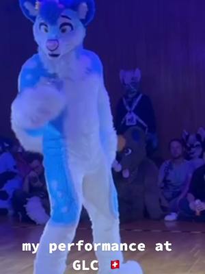 A post by @flukehusky on TikTok caption: My performance at Golden Leaves Con in Switzerland 🇨🇭for the fursuit dance comp 😍 #fyp #dance #fursuit #dancer #unholy #samsmith #kimpetras 