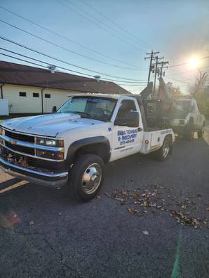 A post by @billyhatfield4 on TikTok caption: when you have to tow a tow truck#towtruck #chevy #ford #towing #billystowingandrecovery #slingtowing