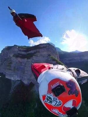 A post by @extremesports2077 on TikTok caption: #extremesports #amazing #GenshinImpact32 #freedom #insane #batman #falling #wingsuit 