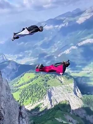 A post by @extremesports2077 on TikTok caption: #extremesports #amazing #freedom #insane #batman #falling #wingsuit #fly #floating 