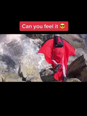 A post by @extremesports2077 on TikTok caption: #ChevyEVSongContest #extremesports #amazing #freedom #insane #batman #falling #fly #wingsuit #wings 