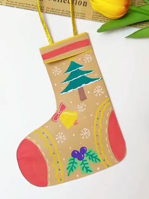 A post by @diyeasily on TikTok caption: Christmas sock#DIY #christmas #usa #tiktok #handmade #diyidea #christmastiktok #diychristmas #christmasideas #christmastree #christmastime#christmassocks