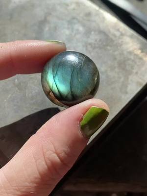 A post by @thlaylidesigns on TikTok caption: Flashy Labradorite with moon and star! #silversmith #metalsmithing #jewelry #cottagecore #artistsoftiktok #witch #labradorite #moonjewelry 