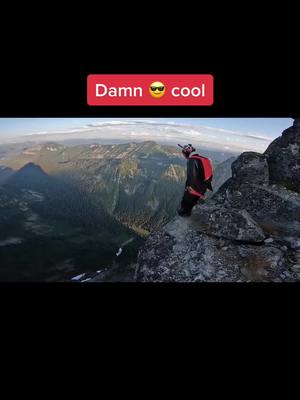 A post by @extremesports2077 on TikTok caption: #freedom #insane #wingsuit #fly #candycrush10 #amazing #extremesports #falling 