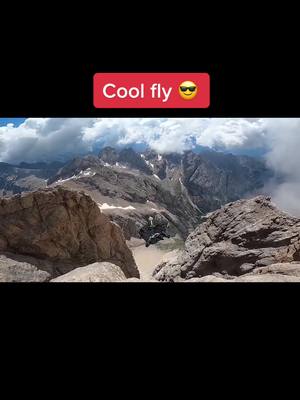 A post by @extremesports2077 on TikTok caption: #freedom #insane #wingsuit #fly #candycrush10 #wingsuit  #extremesports #falling #batman 