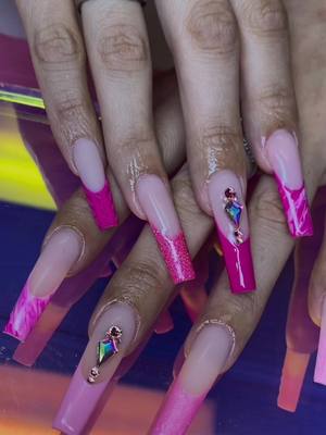 A post by @slaydclawz on TikTok caption: When you can’t choose which pink so you do both 💖💅🏼 #pink #pinknails #fyp #longnails #nailtech 