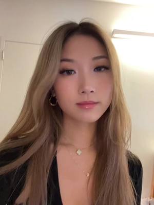 A post by @lin3angel on TikTok caption: can’t decide if i wanna curl my hair or not