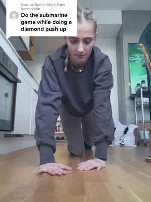 A post by @maymcg on TikTok caption: Svarer @Spider-Man_Fan doing it with diamond hand position 👍🏼 #fyp #workout #pushups 