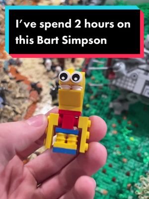 A post by @jpbricks on TikTok caption: If this video gets 2K likes I’ll put this fig on the moc #lego #fypシ #jpbricks #meme #bartsimpson #2hours #😁 #🥓🍞👍 #legotok #viral 